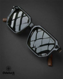 نمای زاویهدار و بازتاب نور روی عدسیهای پولارایز عینک MOSCOT کد 465